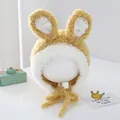 Detail view of plush bunny ears and soft fleece texture on a warm baby trapper hat - 2-6 Years Old / Yellow