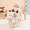Beige kids winter trapper hat with green dinosaur embroidery and cozy pom-poms - Children (3-8 Years Old) / Beige