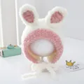 Detail of plush baby winter hat with cute bunny ears and pink pompom ties - 2-6 Years Old / Pink