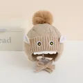 Winter baby knit hat with faux fur pompom and cartoon monster eyes in khaki beige - Kids 1-4 Years Elastic / Khaki
