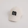 Winter fleece baseball cap for kids in off-white with black M letter embroidery - Beige