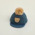Navy blue winter baby baseball cap with plush bear patch and soft brown pompom - 0-3 Years Old / Blue