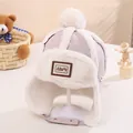 Rosafarbene Wintermütze für Kinder mit Kunstfellfutter und weichem Bommel-Detail - Altrosa