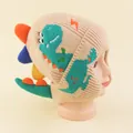 Beige baby dinosaur knit hat with colorful ear flaps for warmth in autumn and winter - 48-52cm / Beige