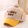 Detail of warm winter hat showing plush beige faux fur and yellow corduroy texture - Kids (48-54CM) / Yellow