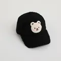 Detail of black sherpa fleece baseball cap with cute embroidered cartoon bear patch - Kids Universal Size / Black
