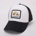 Detail of cartoon excavator and truck embroidery on a two-tone baseball cap - Black