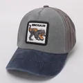 Detail of children's baseball cap featuring a dinosaur embroidery patch and two-tone fabric - Gray Blue Block (Dinosaur)