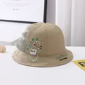 Detail of khaki cotton baby sun hat with cute dinosaur embroidery and 3D decorative spines - Kids Size / Khaki