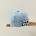 Hellblaue Kinder-Denim-Kappe mit stylischem schwarz-weißem Angels-Stickaufnäher - Stil 1 Helles Denim (ANGELS)