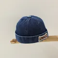 Dunkelblaue Denim-Miki-Mütze für Kinder mit weißer ANGELS-Stickerei an der Seite - Stil 1 Dunkles Denim (ANGELS)