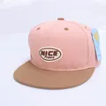 Detail of pink and brown color block baseball cap with NICE Prance embroidery patch - Children's Size (Adjustable) / Pink