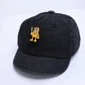 Dark grey denim baseball cap for kids featuring a yellow cartoon character patch - 46-48cm / Black