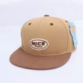 Detailed view of kids hip hop baseball cap featuring NICE embroidery and flat brim - Children's Size (Adjustable) / Khaki