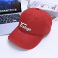Macro detail of high-quality vintage 3D embroidery on a red cotton baseball cap - Kids 3-10 Years 50-54CM / Burgundy