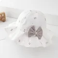 Close-up of white sun hat with brown bows and a large grey mesh ribbon detail - 52-54cm / White