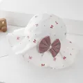 Detail of white baby sun hat with red bow and dots pattern on clean white background - 52-54cm / White with Red Floral