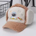 Detail of children's winter pilot hat with soft sherpa fleece and astronaut embroidery - Kids (Approx. 3-10 Years) / Khaki