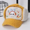 Detail of kids winter warm earflap hat with lamb wool texture and cartoon bunny design - Kids / Yellow
