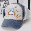 Detailed view of winter kid hat with plush faux fur and cute 3D bunny embroidery - Kids / Blue