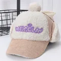 Detalle del gorro de invierno rosa para niños con orejeras de forro polar y bordado Angela - Niños (aprox. 2-7 años) / Beige