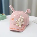 Berretto rosa per neonati con graziose orecchie da coniglio 3D e peluche come parasole - Taglia Bambino / Rosa