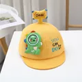 Detail of yellow cotton baby cap with 3D dinosaur patch and OMG embroidery on top - Baby approx. 0-36 months / Dinosaur Applique Style / Yellow