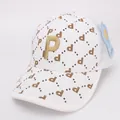 Witte truckerpet voor kinderen met gouden P-borduurwerk en bruine letterprint gaas - Kindermaat / Wit