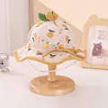 Close-up of beige corduroy baby bucket hat with fruit print and plush 3D fruit accents - Kids 2-6 Years / Bright yellow