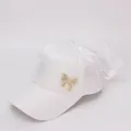 Elegant white satin baseball cap for girls featuring a large bow and pearl butterfly accent - Kids 2-8 Years (47-53CM) / White