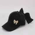 Black velvet kids baseball cap with pearl butterfly and large silk bow detail - Kids 2-8 Years (47-53CM) / Black