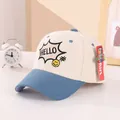 Detalle de gorra de béisbol de pana con bordado HELLO y logotipo de cara sonriente - Niños de 2 a 6 años / Beige