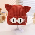 Orange knit baby beanie featuring cute 3D cat ears and crochet white eyes design - Toddler Size (Elastic) / Burgundy