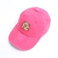 Detailed macro of kids washed cotton baseball cap with cute capybara patch in rose red - 50-53cm / Rose Red
