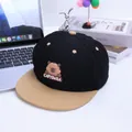 Close-up of contrast color baseball cap featuring a cute cartoon capybara patch and embroidery - Kids 3-8Y (50-54CM) / Black
