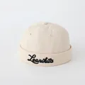 Gorra docker beige Leonikita para bebé con bordado negro y orificios de ventilación - LEAN Beige