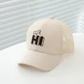 Detail of beige mesh baseball cap featuring embroidered bear face and 3D HI lettering - Kids One Size / Beige