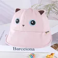 Close-up of pink cotton child hat featuring 3D ears and cute embroidered cat face details - 48-50cm / Cat Pink