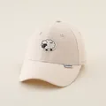 Detail of cream beige kids baseball cap featuring embroidered sheep logo and side woven label - Kids 50-54CM / Solid Beige