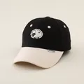 Close-up of contrast kids baseball cap with sheep embroidery and DOUDOU label detail - Kids 50-54CM / Black/White
