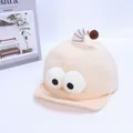 Close-up of cream baby baseball cap with plush cartoon eyes and striped antenna detail - Baby 1-3 Years 46-48CM / Style Two Beige (Big Eyes)