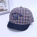 Detail of plaid cotton baseball cap featuring blue embroidery and denim soft brim - 0-18 Months / Orange Brown 2010 Embroidery Style