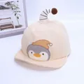 Detail of baby beige baseball cap featuring penguin embroidery and a striped pompom hook - Baby 1-3 Years 46-48CM / Style One Beige (Penguin Embroidery)