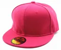 Detailed close-up of rose pink snapback cap with golden sticker and twill texture - Adult Hot Pink