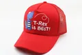 Detail of red kids mesh baseball cap featuring blue cartoon dinosaur and T-Rex text - Kids (2-7 Years) / Solid Red