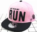 Detail of pink mesh snapback cap with 3D embroidery RUN lettering and flat black brim - Adult / Black Brim + Pink
