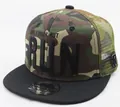 Detail of camouflage trucker hat featuring DON'T WALK BUT RUN embroidery and mesh back - Adult / Camouflage