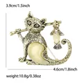 Broche de gato vintage dorado con piedras de ópalo de 4,6cm de ancho y 3,9cm de alto - Oro Antiguo