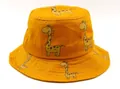Close-up of bright yellow cotton bucket hat with cute cartoon giraffe print patterns - Kids (2-7 Years) / Yellow