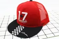 Detail of red mesh trucker hat featuring 3D embroidery and checkered pattern on the brim - Children (3-8 Years Old) / Red (1+7)